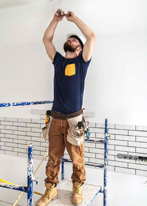 Commercial electrician working